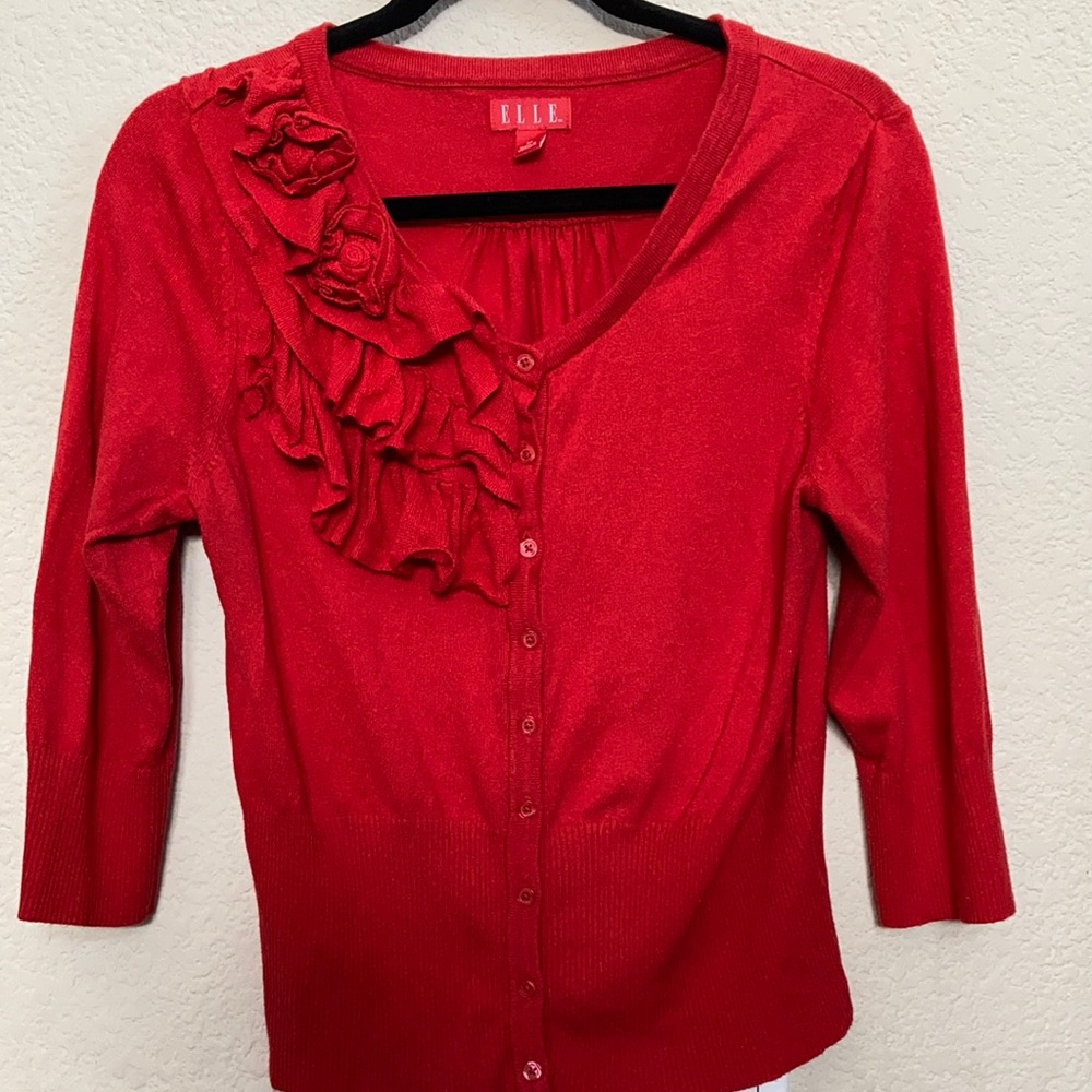Elle Quarter sleeve red sweater w/ rosettes and ruffles on right side, size M